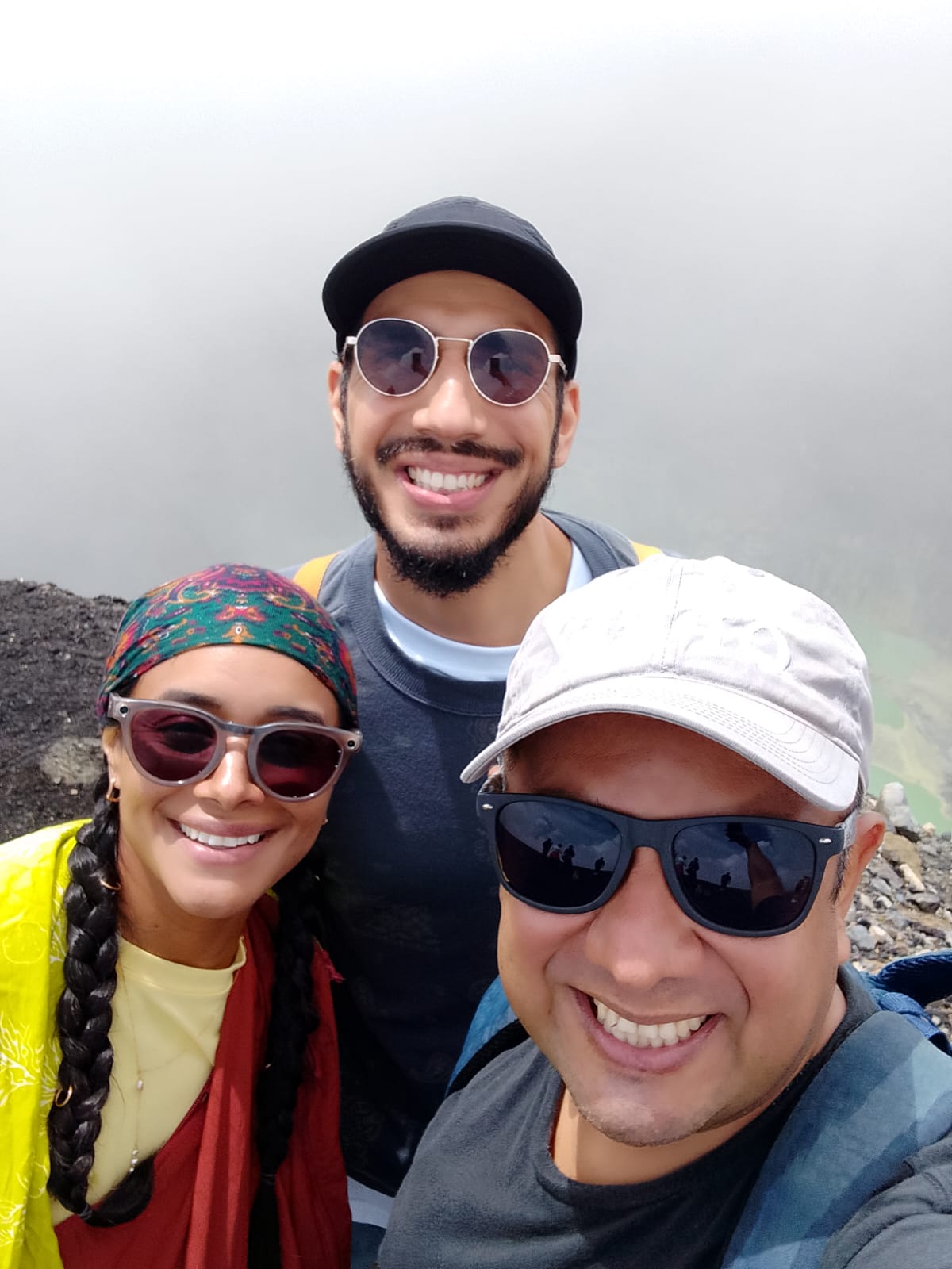 Edna, Max and Mia smiling together at the Ilamatepec crater rim